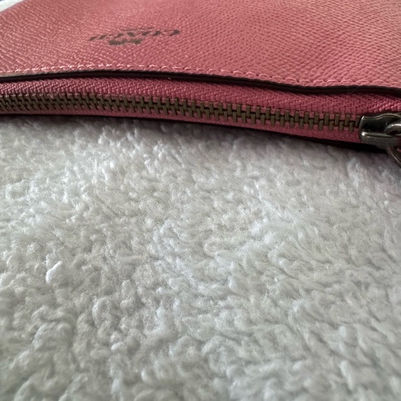 Coach Pink Clutch Minimalist Design